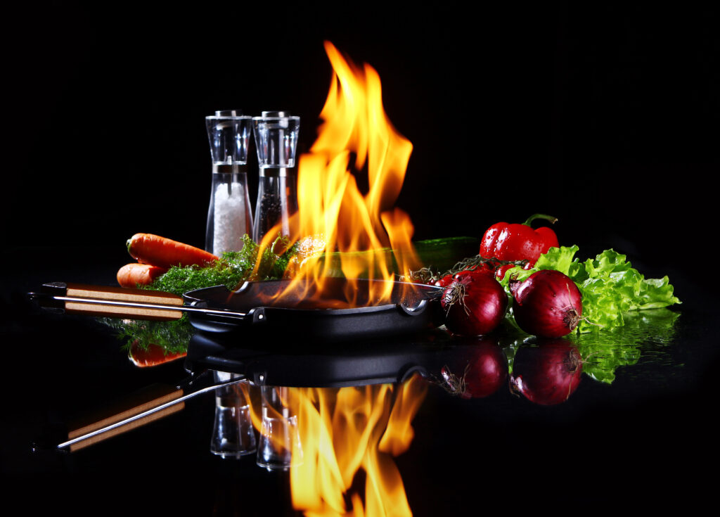 Frying pan with burning fire inside